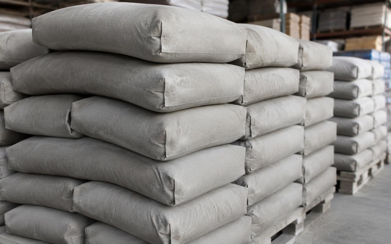 Stacked cement bags at a building material store