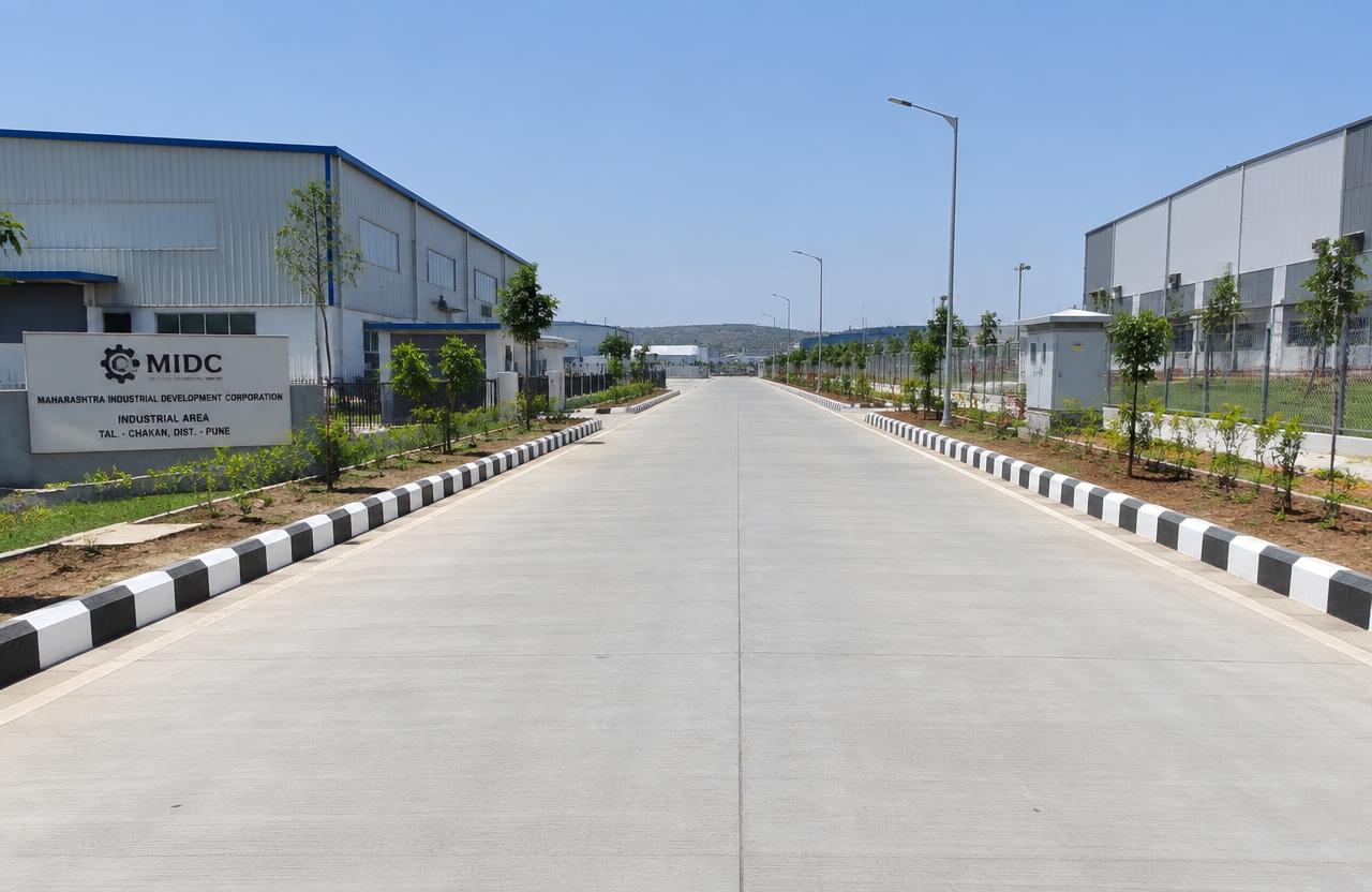 New concrete road with kerbs in an industrial area near Chakan